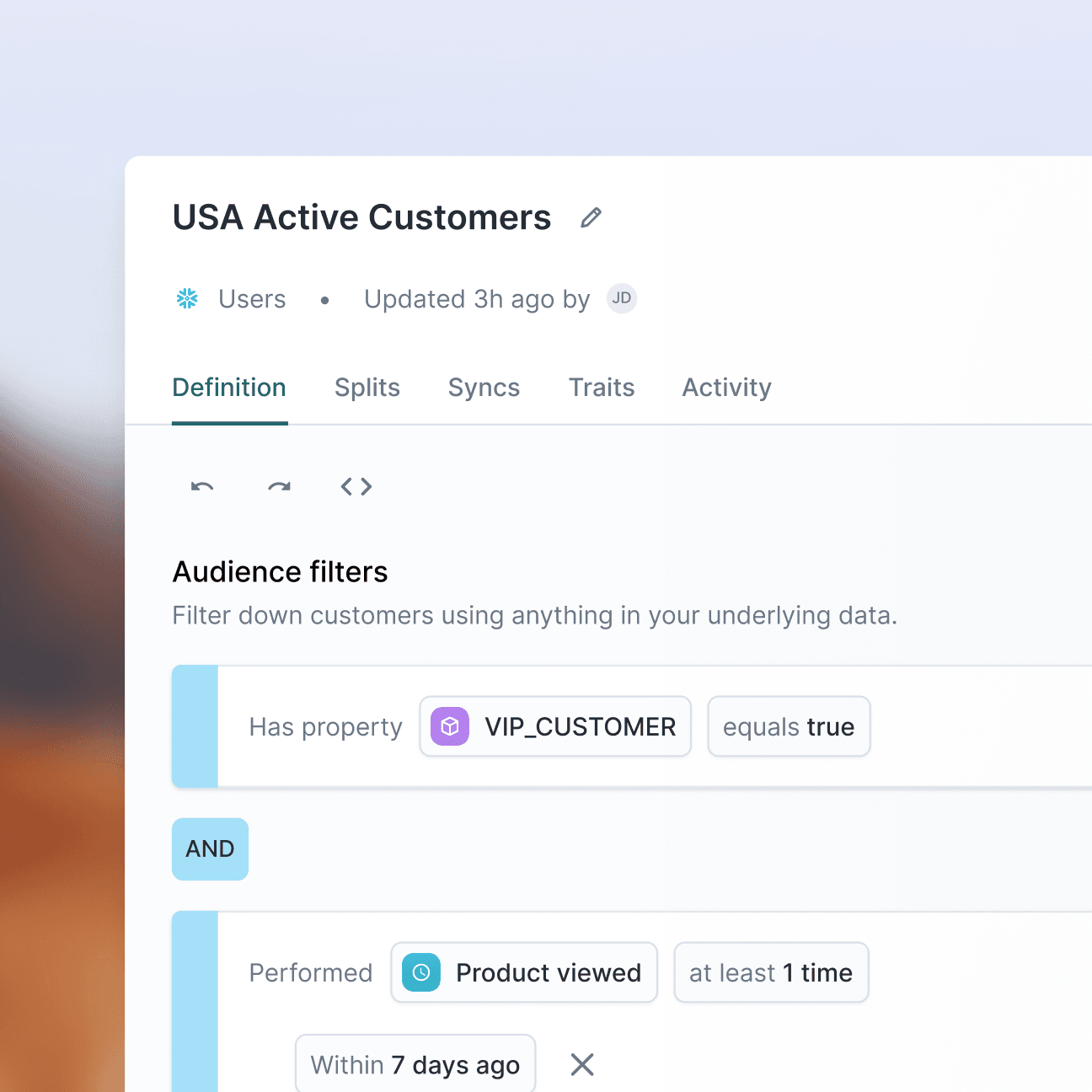 An illustration demonstrating the process of defining an audience filter named "USA Active Customers" in the Hightouch application. The filter specifies that the property "VIP_CUSTOMER" must equal true, and the user must have performed a "Product viewed" action at least once in the past 7 days.