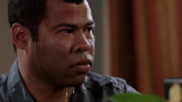 A GIF of actor Jordan Peele (from Key & Peele) sweating profusely and looking nervous.