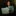 An single person smiling and using a laptop.