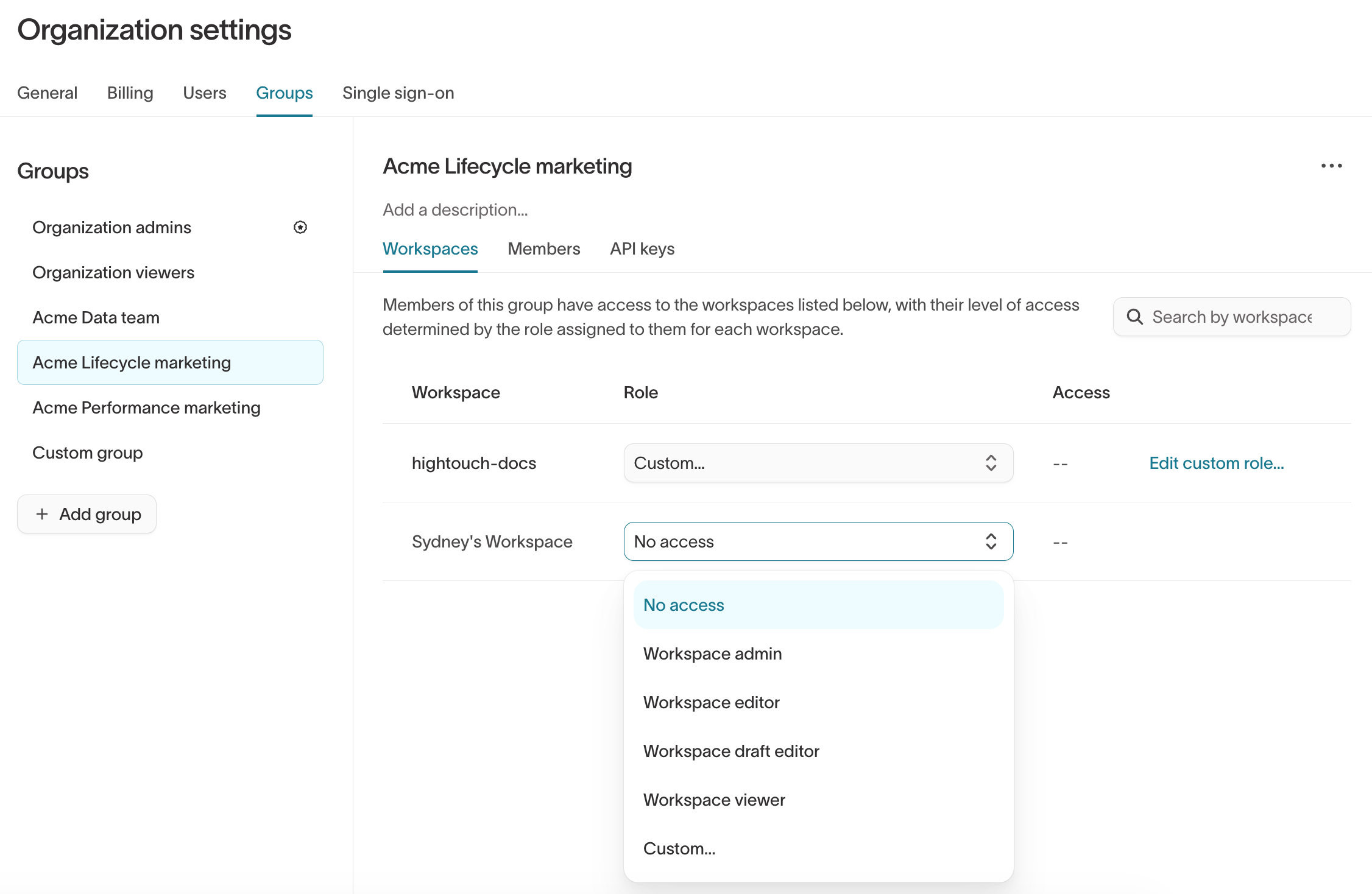 The Workspaces tab of a group in Organization settings, with the Role dropdown open